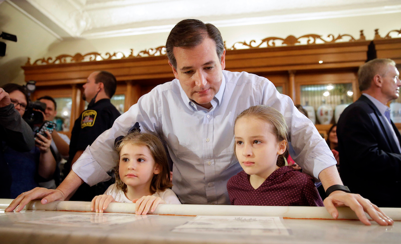 Caroline Cruz, right, is allowed an ice cream at an April campaign stop at Zaharakos Ice Cream Parlor in Columbus, Indiana. This gesture alone cannot please her. She stares at the kindly person behind the counter, who seems like they would be a nice parent; she briefly ponders whether one can secede from a family, the way that dad says Texas will secede from the U.S. (AP)
